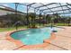 Sparkling pool with fountains, integrated spa, a basketball hoop, and lush landscaping within a screened enclosure at 319 Morning View Dr, Winter Garden, FL 34787