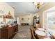 Charming dining area with stylish decor, leading to the living room and kitchen at 3342 Sanborn Ln, Deltona, FL 32738
