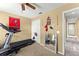 Spare bedroom with ceiling fan is currently used as a personal exercise room at 3342 Sanborn Ln, Deltona, FL 32738