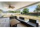 Inviting outdoor patio features comfortable seating and view of the backyard at 3342 Sanborn Ln, Deltona, FL 32738