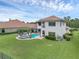 Backyard featuring a sparkling pool, spa, covered patio and lush landscaping creates a private oasis at 4031 Bermuda Grove Pl, Longwood, FL 32779