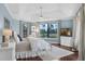 Bright bedroom with a ceiling fan and views of the golf course at 4031 Bermuda Grove Pl, Longwood, FL 32779