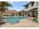 Sparkling pool with a tanning ledge, surrounded by a spacious patio for entertaining at 4031 Bermuda Grove Pl, Longwood, FL 32779