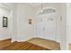 Bright foyer featuring a double-door entrance, high ceilings, and neutral color palette at 41128 Apple St, Eustis, FL 32736