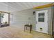 Covered patio with wood decking offering a comfortable space with access to backyard at 41128 Apple St, Eustis, FL 32736
