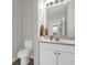 Clean bathroom with a single vanity, toilet, and neutral décor at 4284 New Broad St # 102, Orlando, FL 32814