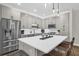 Modern kitchen featuring stainless steel appliances, sleek countertops and ample cabinet space at 4284 New Broad St # 102, Orlando, FL 32814