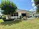 Covered patio with outdoor seating, perfect for entertaining and relaxation in a private backyard at 541 Kistler Cir, Clermont, FL 34715