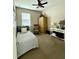 Cozy bedroom with twin bed, ceiling fan, unique decor and neutral color palette at 541 Kistler Cir, Clermont, FL 34715