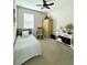 Cozy bedroom with twin bed, ceiling fan, unique decor and neutral color palette at 541 Kistler Cir, Clermont, FL 34715