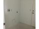 A perfect laundry room for the Gathering with a utility sink and washer dryer hookups at 5733 Haystack Drive, St Cloud, FL 34771