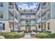 Beautiful courtyard view with lush landscaping and seating, creating a serene outdoor space at 611 Campus St # 160, Celebration, FL 34747