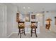 Bright kitchen with modern breakfast bar, offering seating and an open layout at 611 Campus St # 160, Celebration, FL 34747