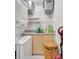 Practical laundry area equipped with a stacked washer/dryer, storage cabinets, and countertops at 611 Campus St # 160, Celebration, FL 34747