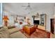 Relaxing living room features tile flooring, neutral paint, and easy access to kitchen/dining areas at 611 Campus St # 160, Celebration, FL 34747