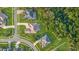 Overhead view of the home featuring mature landscaping, a pool, and private backyard in a desirable neighborhood at 6121 Oxbow Bend Ln, Port Orange, FL 32128