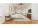 Comfortable main bedroom featuring neutral colors, tray ceiling, and a relaxing atmosphere at 6121 Oxbow Bend Ln, Port Orange, FL 32128
