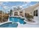 Enclosed pool area offers multiple seating and lounge areas, plus lovely plants at 6121 Oxbow Bend Ln, Port Orange, FL 32128