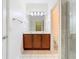 Bright bathroom features a double sink vanity and tile flooring at 7508 Bentonshire Ave, Windermere, FL 34786