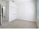 Bedroom featuring carpet flooring, closet and window to provide natural light at 7508 Bentonshire Ave, Windermere, FL 34786