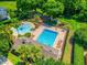 Aerial view of the community pool, splash pad, playground and recreation areas at 3010 Egrets Landing Dr, Lake Mary, FL 32746