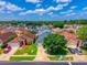 Aerial view of the house showcasing the front yard, landscaping, and neighborhood at 3010 Egrets Landing Dr, Lake Mary, FL 32746
