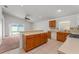 Functional kitchen features a breakfast bar, tiled floors, and a view to the outdoors at 3010 Egrets Landing Dr, Lake Mary, FL 32746