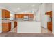 Well-equipped kitchen with ample counter space, light wood cabinetry, and tiled backsplash at 3010 Egrets Landing Dr, Lake Mary, FL 32746