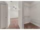 Spacious walk-in closet with built-in wire shelving and neutral carpeting at 3010 Egrets Landing Dr, Lake Mary, FL 32746