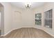 Inviting dining area with hardwood floors, natural lighting, and neutral walls, perfect for gatherings at 1062 Wickerwood St, Ocoee, FL 34761