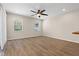 Open-concept space with modern flooring, recessed lighting, and large windows, creating a welcoming atmosphere at 1062 Wickerwood St, Ocoee, FL 34761