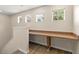 Upstairs Landing with built-in desk and three windows at 1062 Wickerwood St, Ocoee, FL 34761