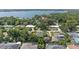 Stunning aerial view of a property showcasing its proximity to a serene lake and beautiful landscaping at 1271 Old Mill Rd, Orlando, FL 32806