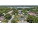 Aerial view of a charming neighborhood with mature trees and well-maintained lawns and proximity to water at 1271 Old Mill Rd, Orlando, FL 32806