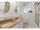 Bright bathroom featuring granite countertops, and double sinks at 1271 Old Mill Rd, Orlando, FL 32806