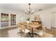 Dining area with hardwood floors with views of the outdoor patio at 1271 Old Mill Rd, Orlando, FL 32806