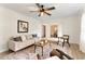 Inviting living room featuring a neutral color palette, modern decor, and an open layout to the dining area at 1271 Old Mill Rd, Orlando, FL 32806