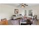 Bright living room featuring neutral tones, stylish furnishings, and hardwood floors at 1271 Old Mill Rd, Orlando, FL 32806