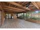 Large screened patio with brick floor, wood ceiling and wet bar at 1271 Old Mill Rd, Orlando, FL 32806