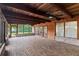 Screened patio featuring brick floor, wood ceiling and access to backyard at 1271 Old Mill Rd, Orlando, FL 32806