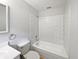 Clean bathroom features a subway tiled shower-tub and modern fixtures at 13794 Sw 112Th St, Dunnellon, FL 34432