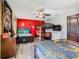 Spacious themed bedroom with full and bunk beds, dresser, and ceiling fan at 1478 Moon Valley Dr, Davenport, FL 33896