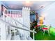Whimsical themed bedroom with castle-inspired loft bed, floral accents, and playful decor at 1478 Moon Valley Dr, Davenport, FL 33896
