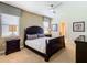 Stylish bedroom offers a dark wood bed frame, neutral walls, and a window with modern blinds at 1478 Moon Valley Dr, Davenport, FL 33896