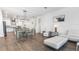 Open-concept living and dining area with modern furnishings and décor at 14955 Lebeau Loop, Winter Garden, FL 34787