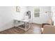 Bright home office space with desk, seating, decor, and natural light at 14955 Lebeau Loop, Winter Garden, FL 34787