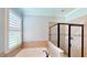 Bright bathroom featuring a soaking tub, glass shower, and plantation shutters at 15510 Lake Burnett Shore Ct, Winter Garden, FL 34787