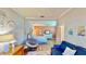 Sitting room with a view to connected bedroom, offering a comfortable and inviting space at 15510 Lake Burnett Shore Ct, Winter Garden, FL 34787