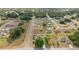 Aerial view of homes in a community, each with unique landscaping, and spaced properties at 16190 Sw 16Th Ct, Ocala, FL 34473