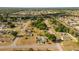 Expansive aerial view showing the layout of a residential community and surrounding landscape at 16190 Sw 16Th Ct, Ocala, FL 34473